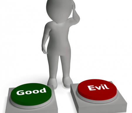 Person looking confused with two buttons in front of him. One says "good" and the other says "evil"