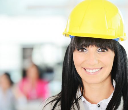 Women wearing construction hat