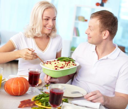 Couple eating Thanksgiving meal together